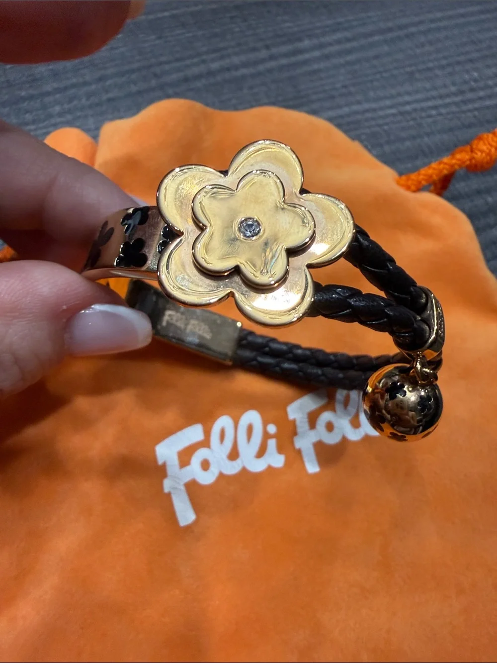 Folli Follie Black Braided Leather Bracelet with Gold Flower Accent